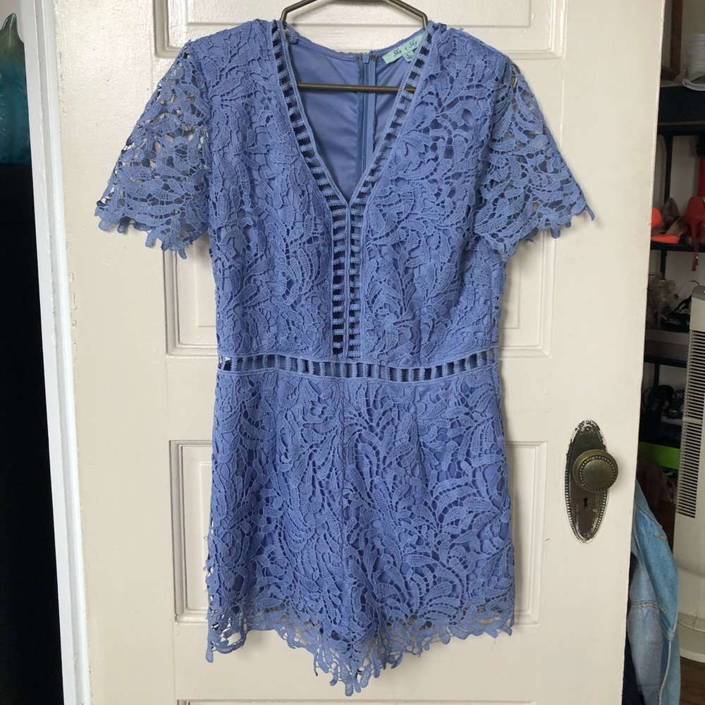 Lace romper with cutouts